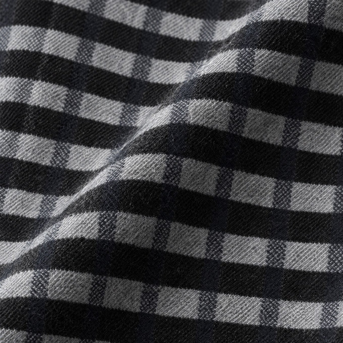 Mody men's black plaid flannel fabric close up