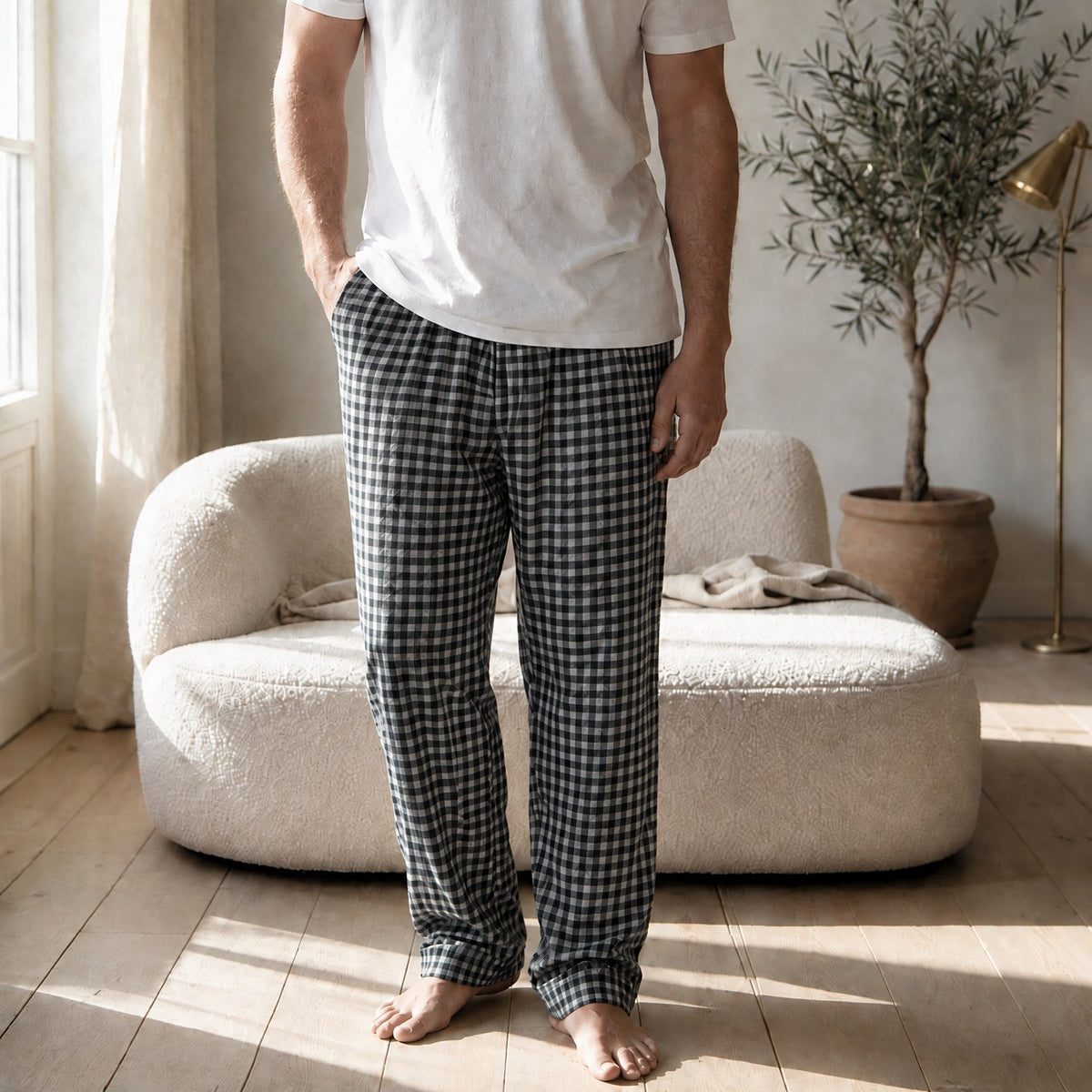 Mody men's black plaid flannel lounge pants worn by model