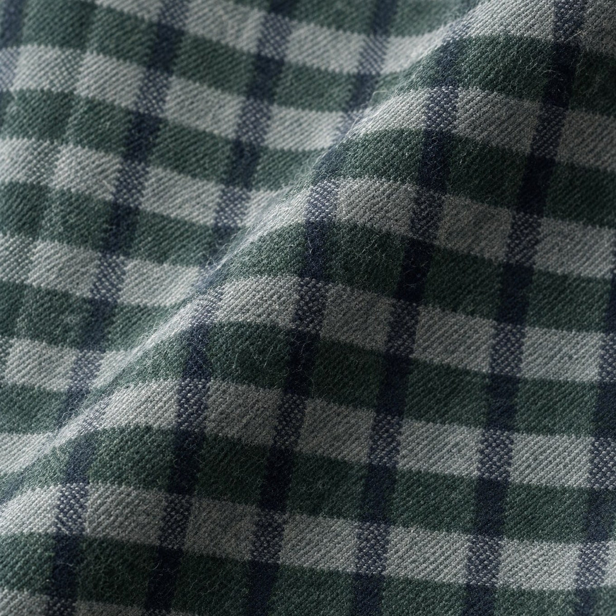 Mody men's green plaid flannel fabric close up