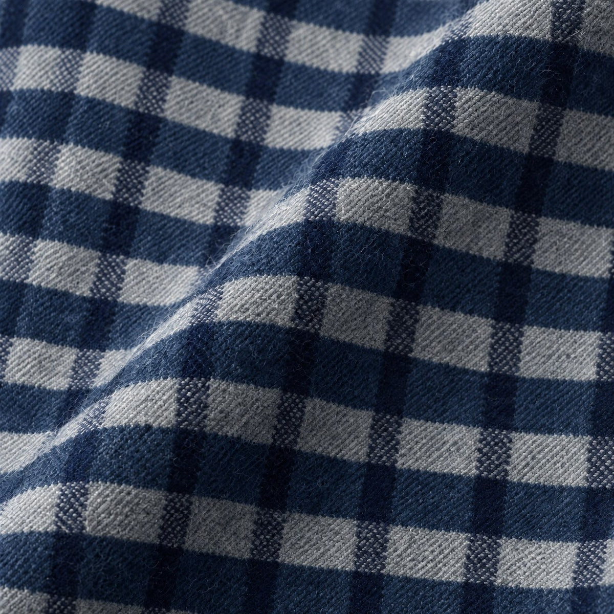 Mody men's navy plaid flannel fabric close up